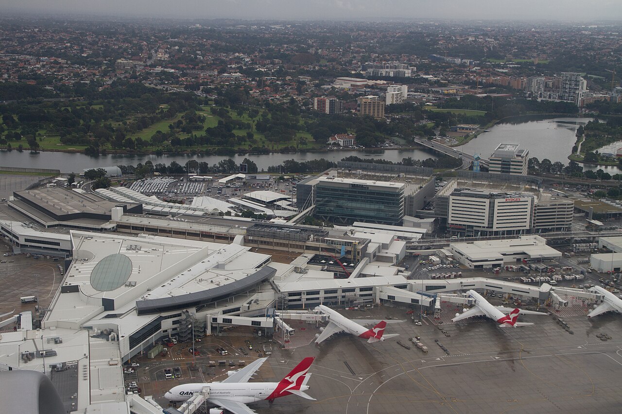 An aerial view of Sydney Airport’s international terminal and parked aircraft