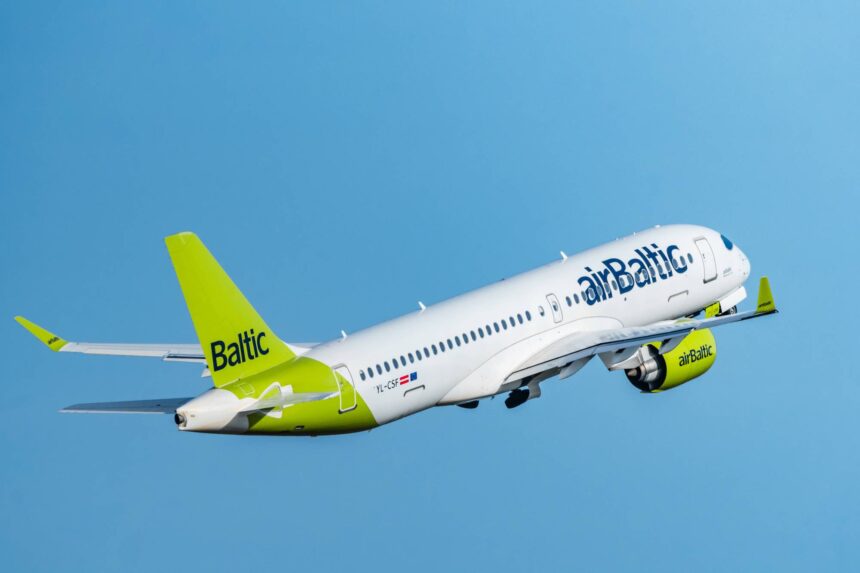 A picture of an airBaltic Airbus A220-300 aircraft on take-off