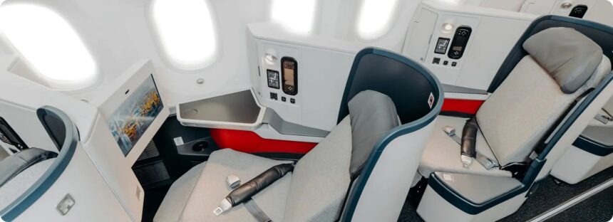 New cabin seats for Avianca Airlines INSIGNIA Business Class. They look modern with a white and grey design opposed with a splash of red that makes the cabin stand out.