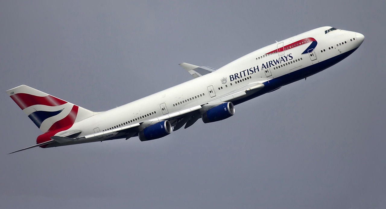 British Airways plane is flying across the sky