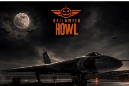 Halloween Howl event poster featuring the Avro Vulcan XH558 aircraft against a full moon and dark background.