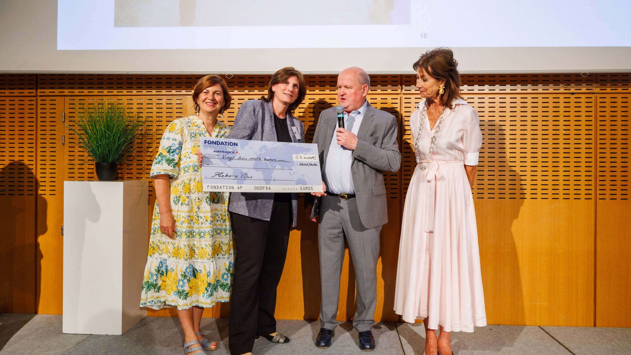 Photograph depicting Air France celebrating its donation to the Mekong Plus project, a non-profit tackling poverty in Vietnam.