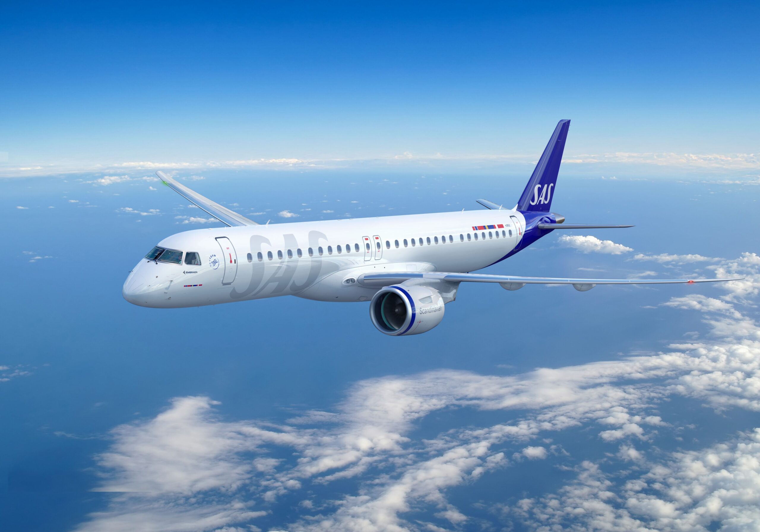 Image shows an SAS Embraer E195 aircraft flying through a blue sky with clouds below