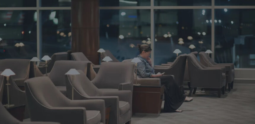 Photograph depicting a woman relaxing at a Star Alliance airport lounge.