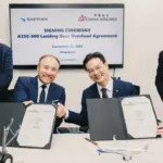 The signing ceremony of the overhaul agreement between China Airlines and Safran Landing Systems in a Singapore office