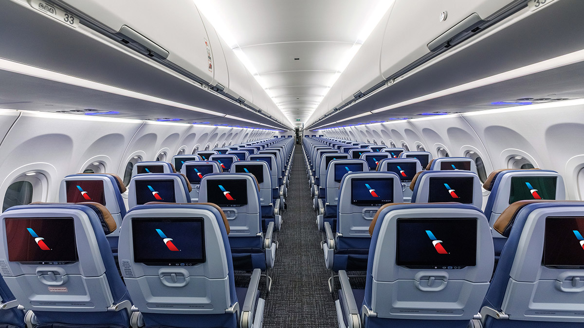 Photograph depicting newly installed 4K screens in the main cabin of American Airlines fleet.