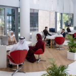 Photograph depicting the seating area and desks within Emirates new travel store in Bahrain.