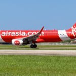 An AirAsia Airbus A320-216(WL) on the ground at Kota Kinabalu International Airport.