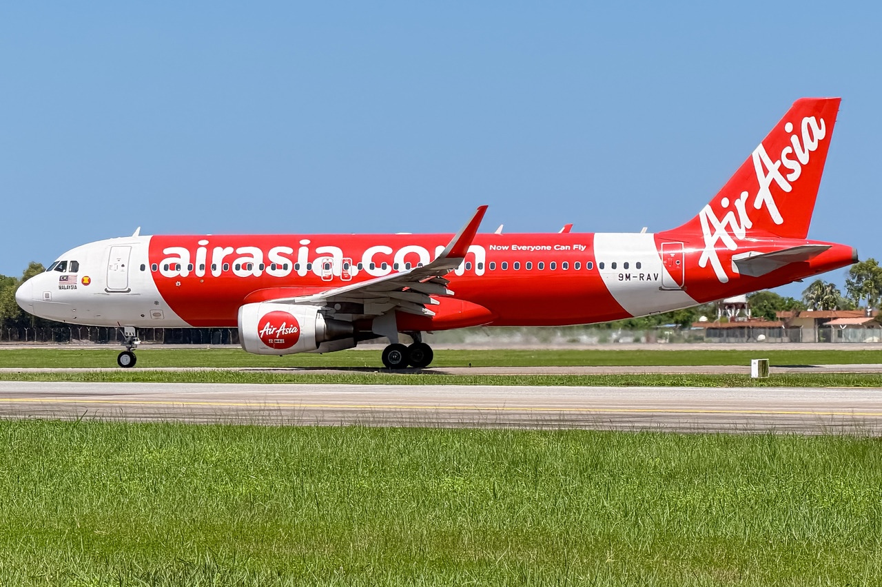 An AirAsia Airbus A320-216(WL) on the ground at Kota Kinabalu International Airport.
