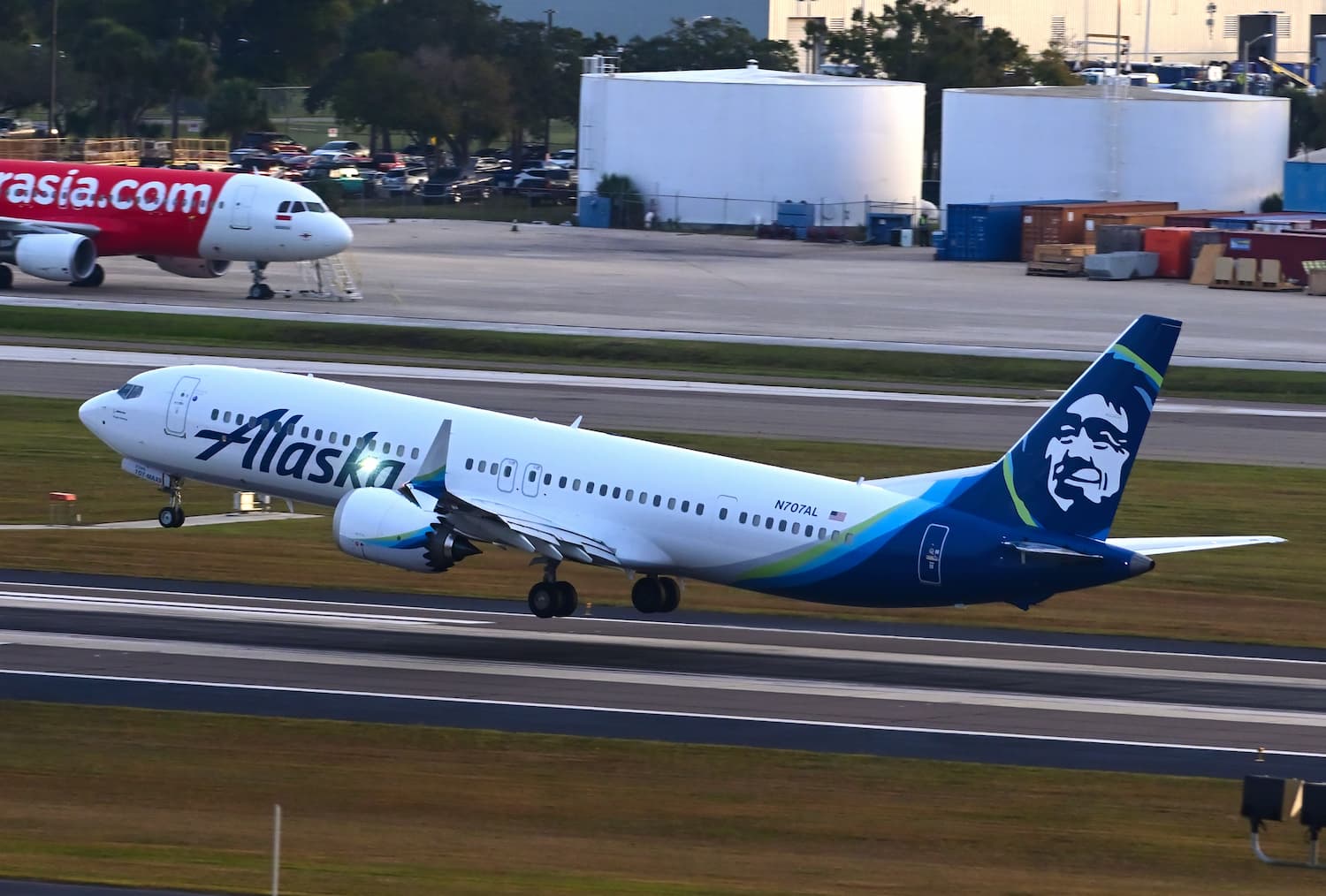 Image shows an Alaska Airlines flight taking off 