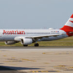 Image shows an Austrian Airlines Airbus A320 from the side