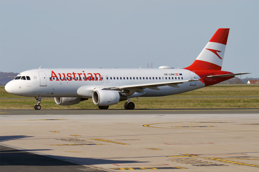 Image shows an Austrian Airlines Airbus A320 from the side