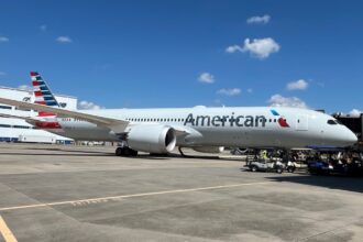 Photograph depicting the exterior of the American Airlines Boeing 787-9 on the runway.