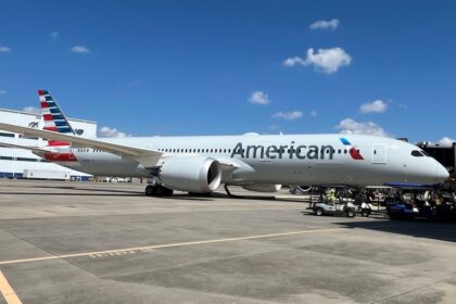 Photograph depicting the exterior of the American Airlines Boeing 787-9 on the runway.