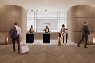Photograph depicting the entrance and entrance desk of British Airways' Terminal 5 airport lounge.