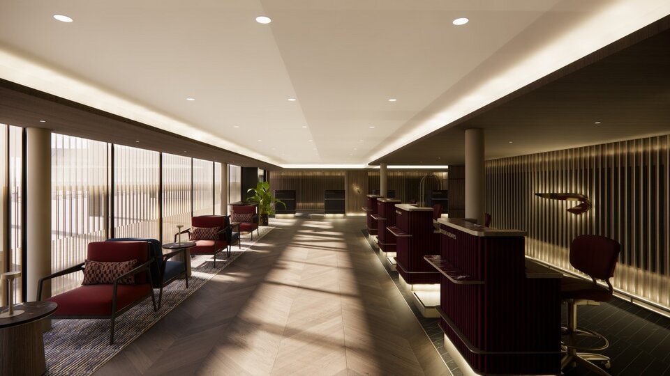 Photograph depicting the welcome desk and physical interior of the updated British Airways lounge.