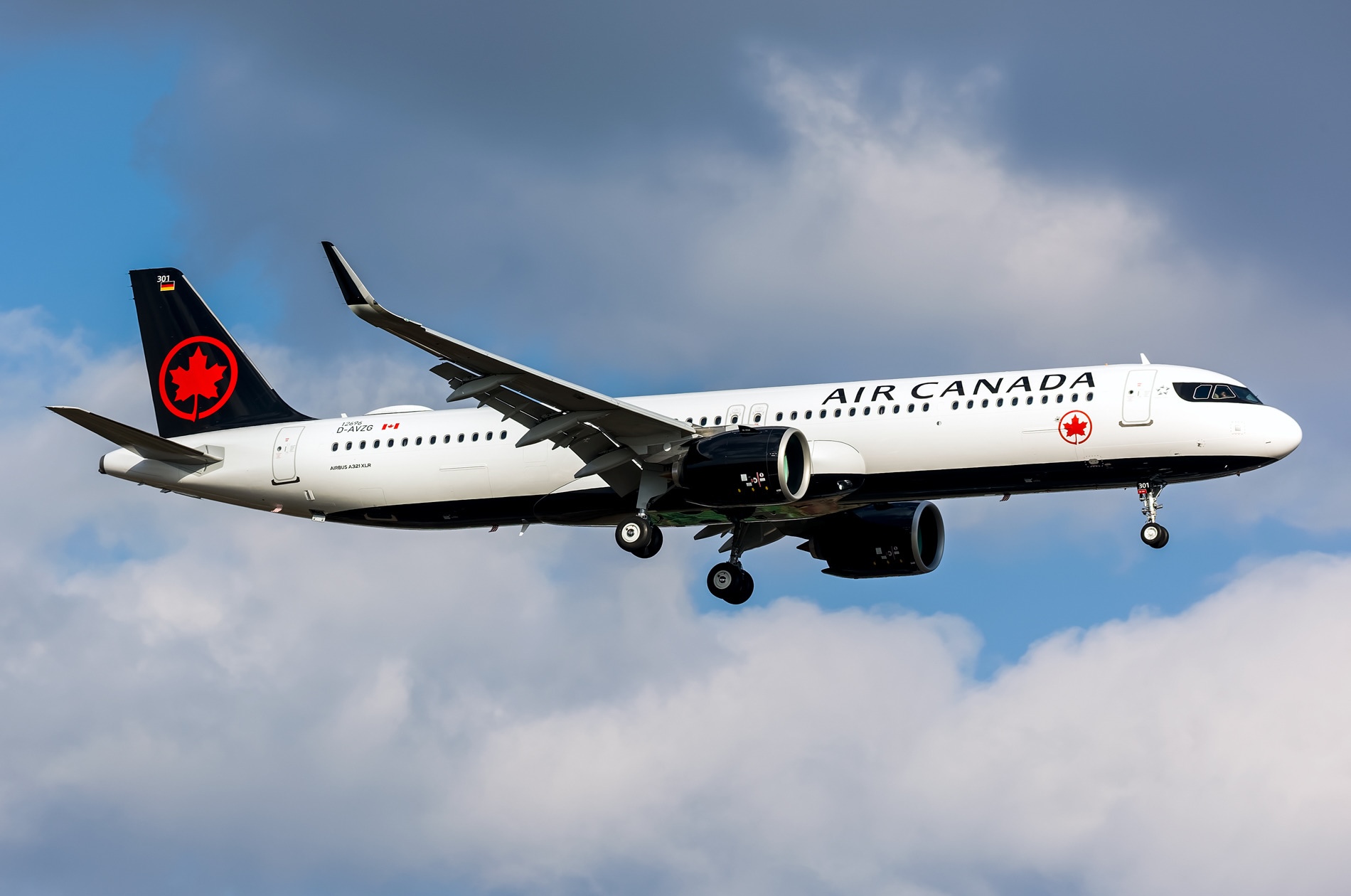 An Air Canada Airbus A321-271NY XLR spotted mid-air with its landing gear extended.
