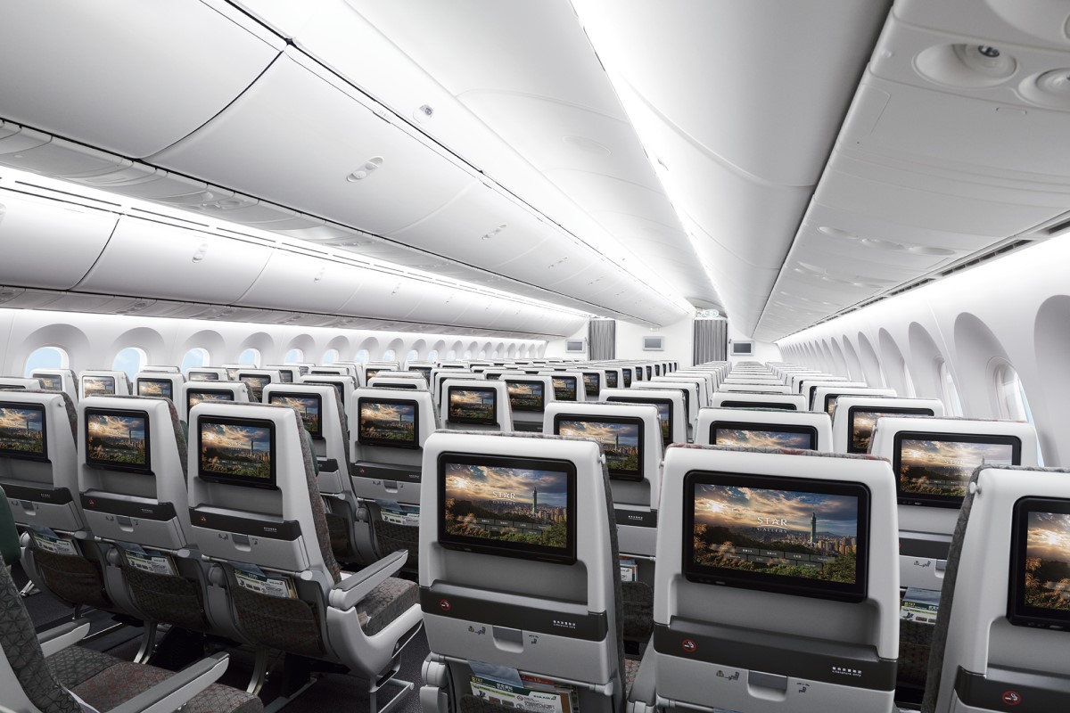 Photograph depicting the physical overview of the EVA Air's Economy Class seats and in-flight entertainment screens.