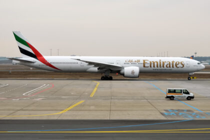 An Emirates Boeing 777-300ER parked at Frankfurt Airport