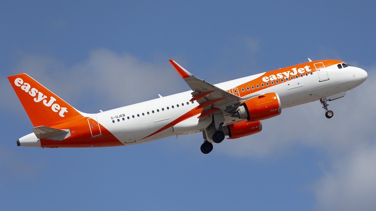An easyJet Airbus A320-251N taking off from Arrecife Lanzarote (ACE / GCRR) with its landing gear still extended.