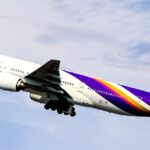 Picture depicting a Thai Airways Boeing 777 during flight