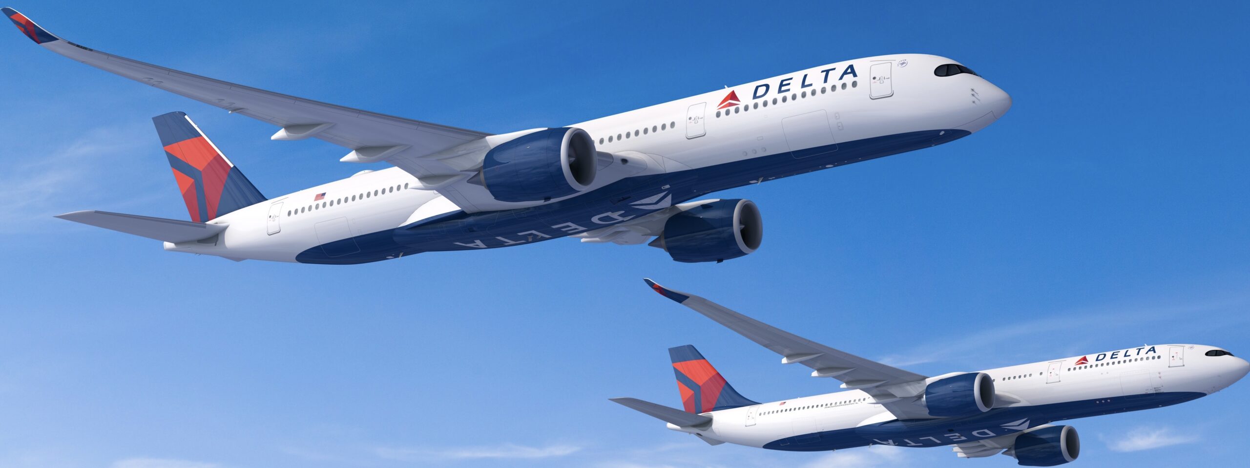 Two red, white, and blue Delta Air Lines jets flying in formation in front of a clear blue sky.