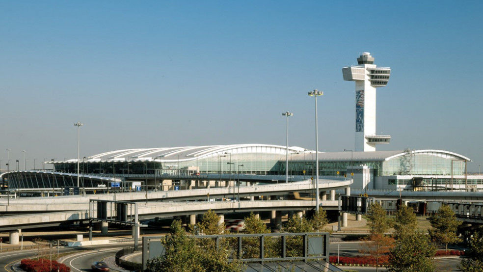  Overview of JFK Airport highlighting its significant control tower and expansive terminal building.