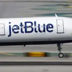 A JetBlue Airbus A321 lands at Los Angeles International Airport.