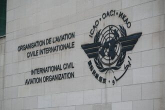 The logo of the International Civil Aviation Organisation on a wall in Montréal