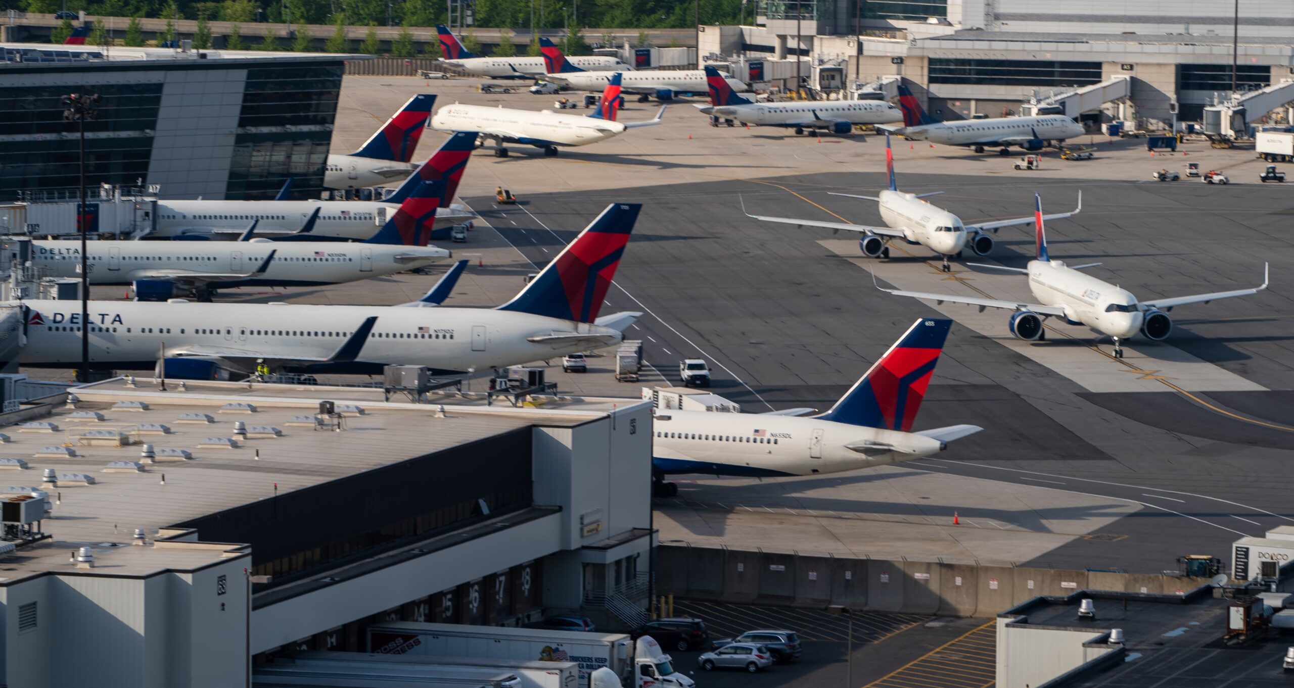 Delta Air Lines aircraft parked along the taxiway