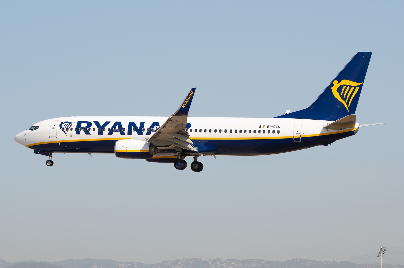 A Ryanair Boeing 737-8AS(WL) spotted at Barcelona El Prat Airport with its landing gear extended.