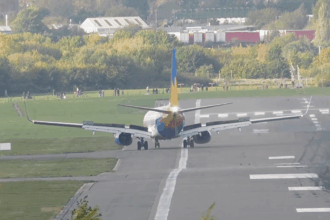 Screenshot of video footage showing the aircraft swerving onto the grass at BHX
