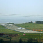 Image shows a Ryanair flight touching down at Leeds Bradford Airport