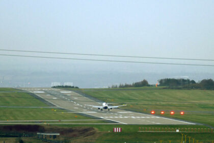 Image shows a Ryanair flight touching down at Leeds Bradford Airport