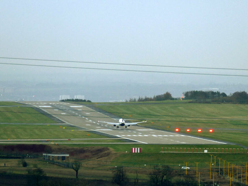 Image shows a Ryanair flight touching down at Leeds Bradford Airport