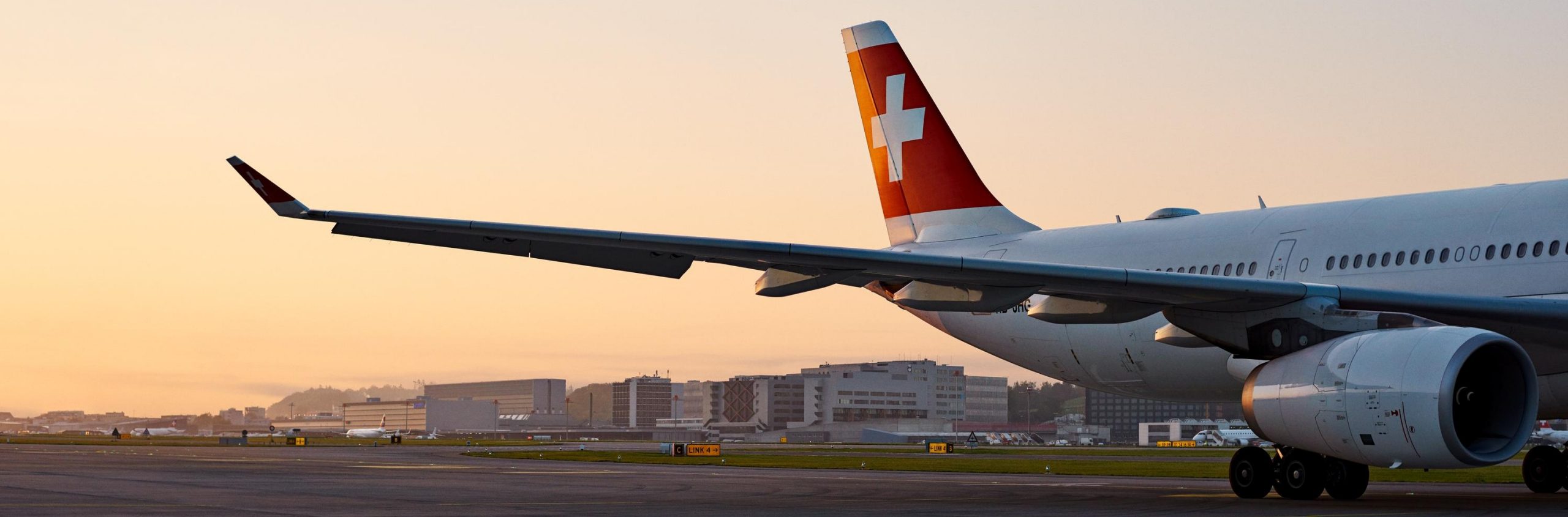 Photograph depicting the SWISS Airbus A330-300 on the runway. 