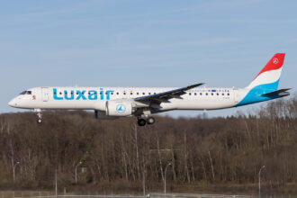 A Luxair Embraer E195-E2 landing at Luxembourg Airport