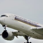 Close-up of Singapore Airlines Airbus A350 aircraft during flight, showcasing its design and engineering.
