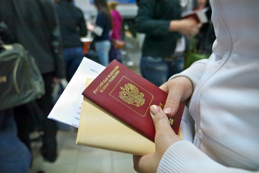 Person holding a Russian passport © depositphotos
